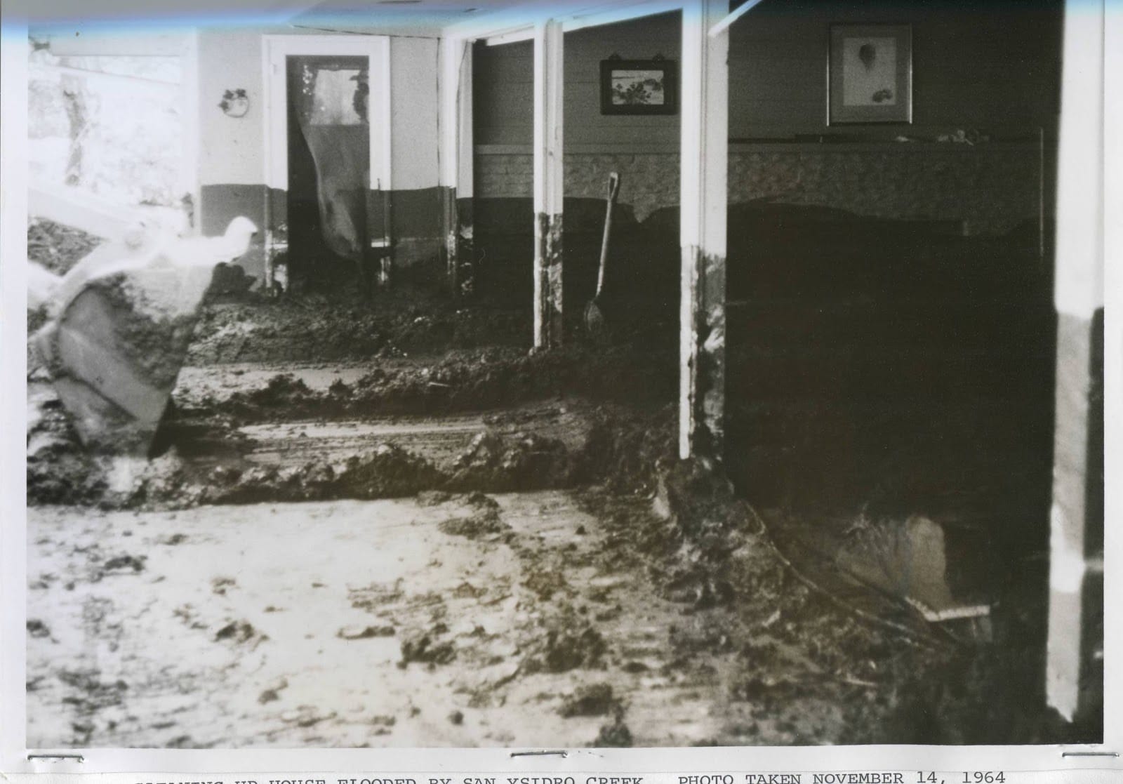 Inside a home near San Ysidro Creek, November 14, 1964. Note distinct mud line on far wall.